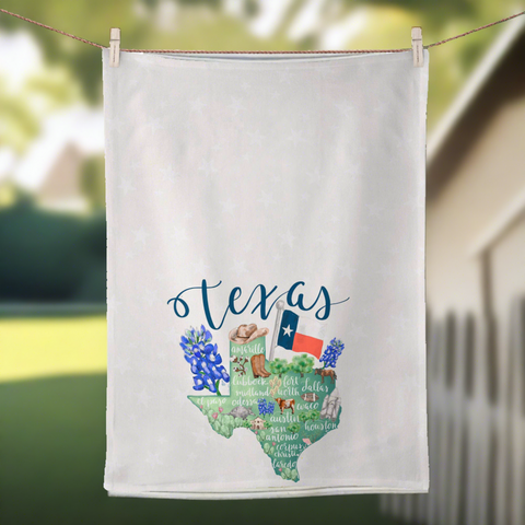 Kitchen Towel themed with state of Texas symbols of flag, longhorn, bluebonnets