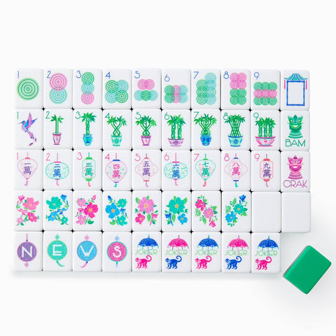 Colorful Mahjong tiles with various designs on a white background