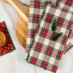 Plaid napkins on a wooden surface.