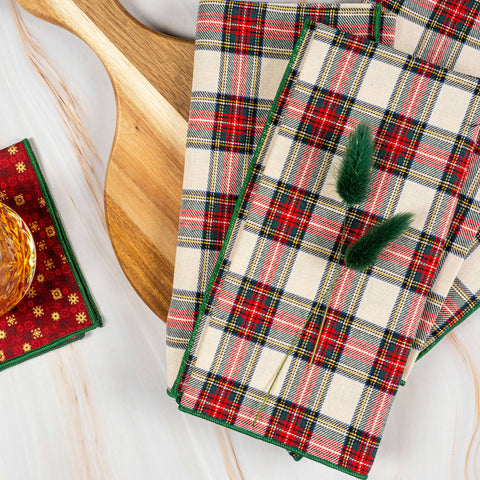 Plaid napkins on a wooden surface.